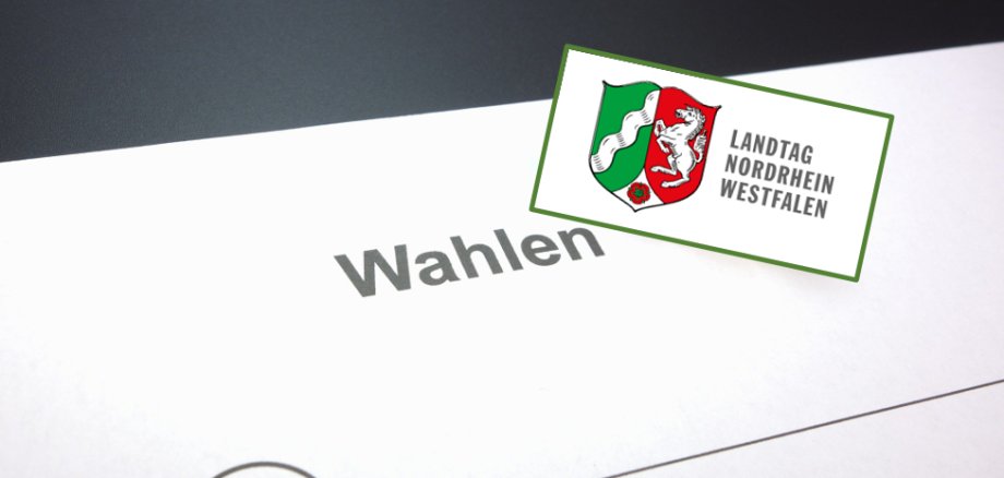 Zettel mit der Aufschrift "Wahlen" und dem Wappen des Landtags NRW